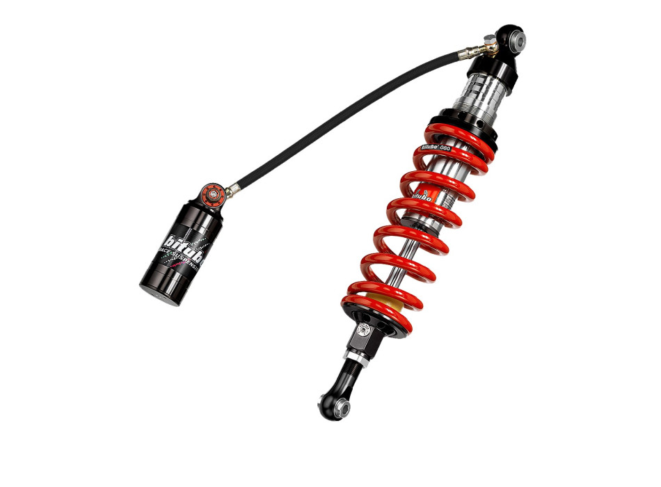 Monoshock avec réglage: précharge du ressort, rebond, double compression, entraxe, ressort Rouge